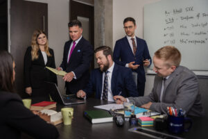 Action Group Shot of Lawyers of Bottos Law Group Working on a Case